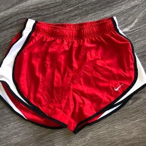 Red Nike running shorts
